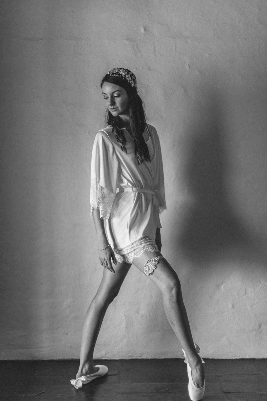 white lace wedding garter, bridal accessories australia, bling crystal pearl wedding garter luxury wedding, luxury garter, lace garter set, crystal bridal garter, white wedding garter, bridal lingerie, bridal boudoir shoot, bow garter, blush underlay wedding gown, white lace garters 