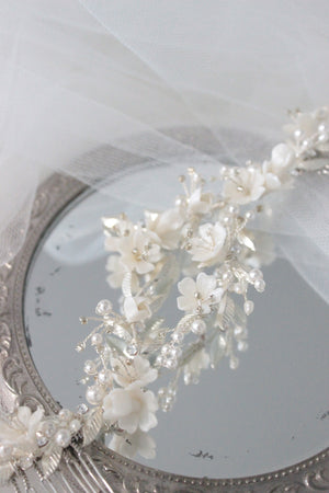 Bridal hair piece with white flowers, pearls and silver leaves