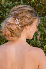 MICHAN | Simple and minimalist bridal hair pins with light pink of white flowers