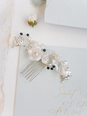 Silver bridal hair comb with roses, flowers, and blue pearls and crystals as something blue