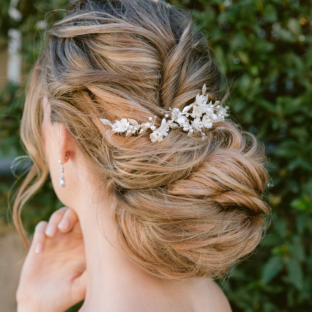 Silver bridal headpiece that can be worn with a veil and updo.